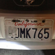 A California driver tried to avoid a highway toll by obscuring his license plate with the sticker from a pack of chicken wings he bought earlier.